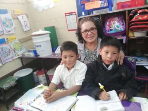 Guatemalan teacher and students